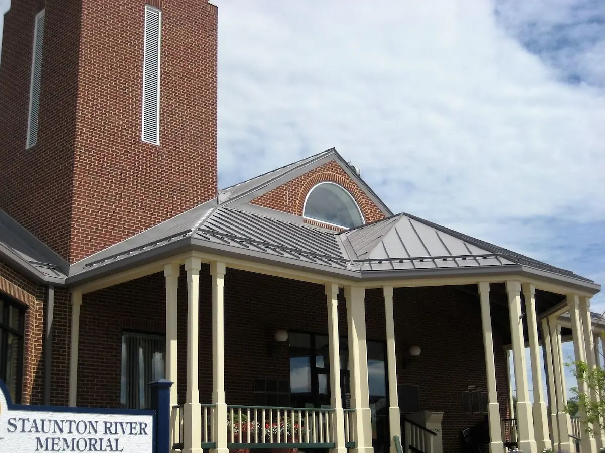 Skilled roofing craftsmen working on a residential roof in Argyle
